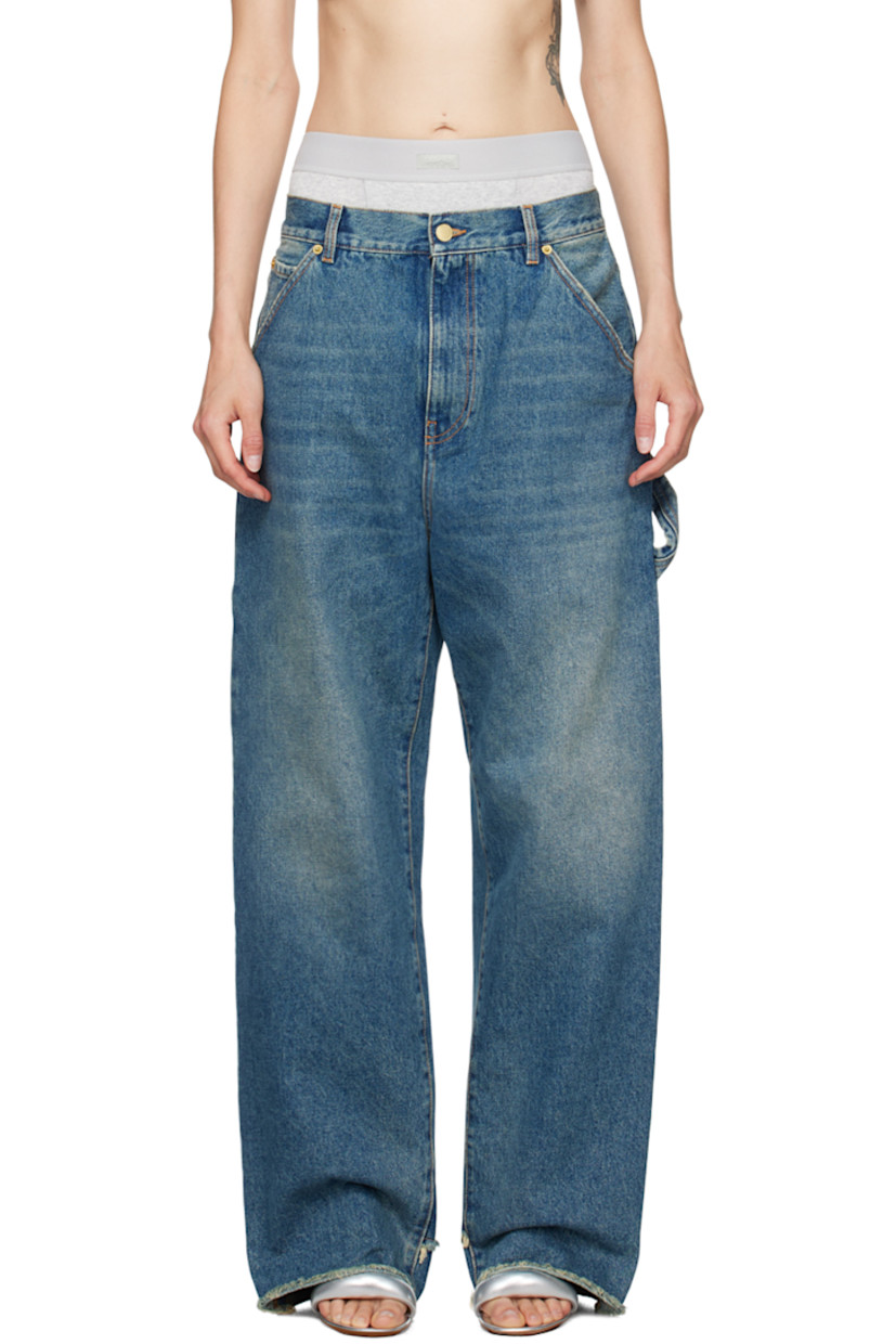Loose-fit wide-leg non-stretch denim jeans. Fading and whiskering throughout.

· Belt loops
· Five-pocket styling
· Zip-fly
· Raw edge and rip at cuffs
· Dropped inseam
· Patch pocket at outseam
· Hammer loop at outseam
· Leather logo patch at back waistband
· Logo-engraved gold-tone hardware
· Contrast stitching in tan

Supplier color: Medium wash