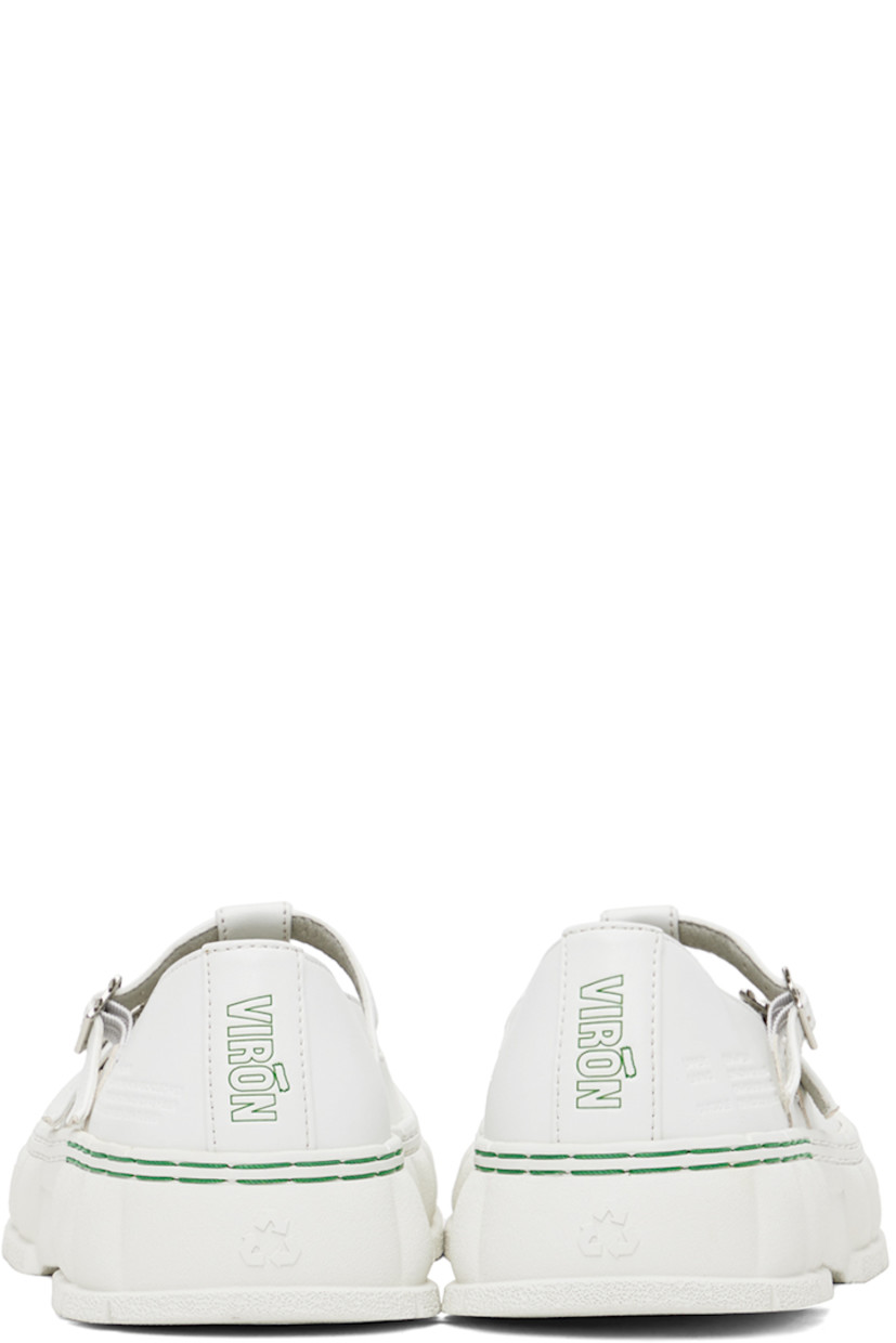 Handcrafted Appleskin™ faux-leather Mary Jane-style loafers in white.

· PETA-certified
· Adjustable pin-buckle straps at vamp
· Text embossed at outer side
· Logo embossed at heel
· Logo printed at padded insole
· Grained faux-leather lining
· Textured recycled rubber-blend sole
· Contrast stitching in green

Supplier color: White