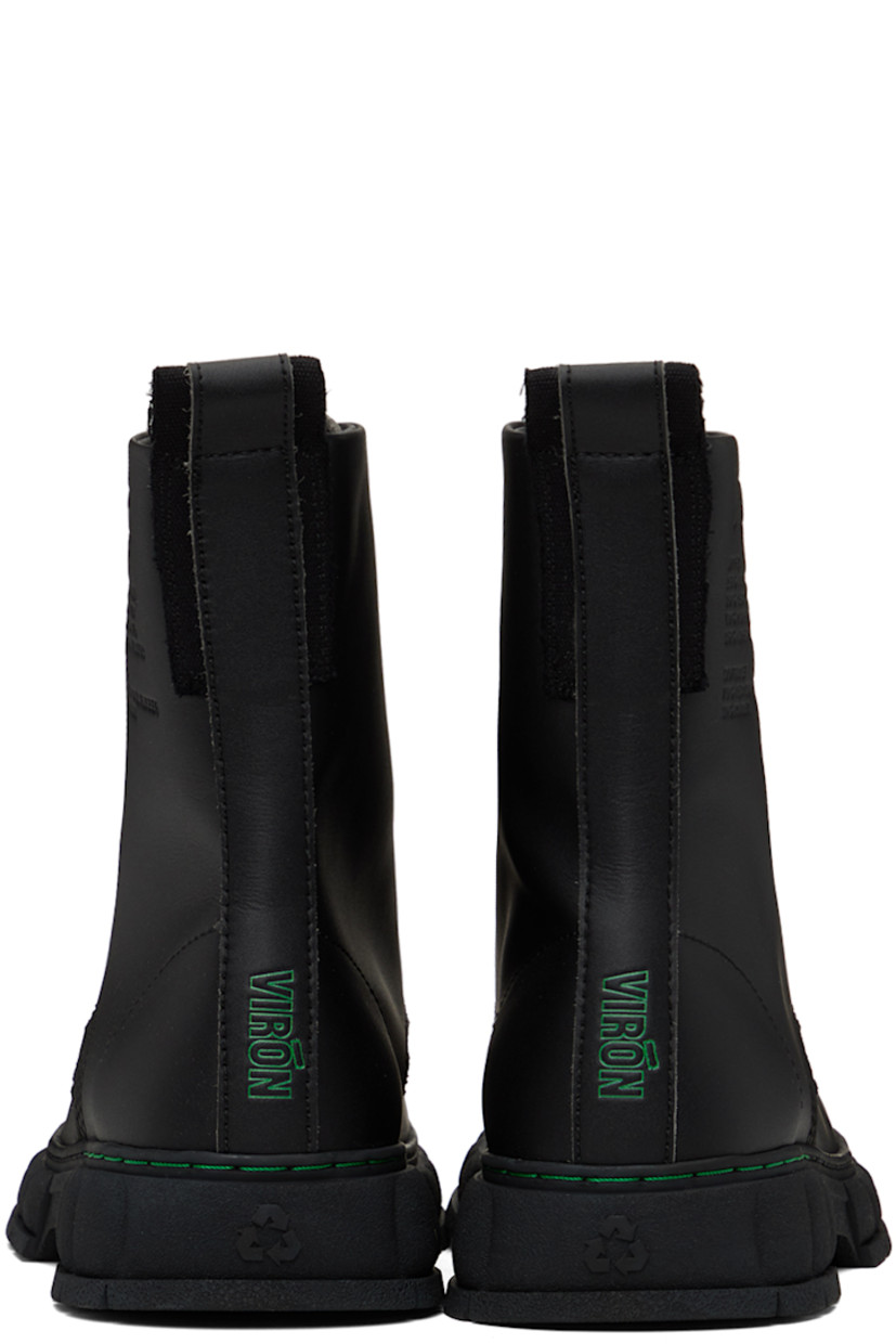 Handcrafted ankle-high corn-polymer faux-leather boots in black.

· PETA-certified
· Lace-up closure
· Logo embossed at tongue and heel counter
· Logo and text embossed at outer side
· Pull-loop at heel
· Logo printed at padded insole
· Grained faux-leather lining
· Textured recycled rubber-blend sole
· Contrast stitching in green
· Platform: H1.5"

Supplier color: Black