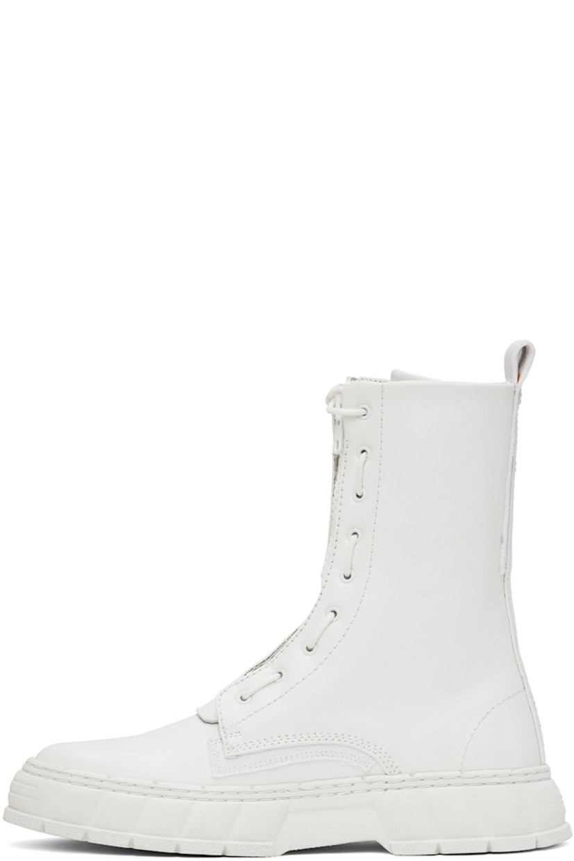 Handcrafted ankle-high Appleskin™ faux-leather boots in white.

· PETA-certified
· Zip closure
· Wraparound lace-up fastening
· Text printed at outer side
· Pull-loop at heel
· Logo embossed at heel counter
· Logo printed at padded insole
· Faux-leather lining
· Textured recycled rubber-blend sole

Supplier color: White