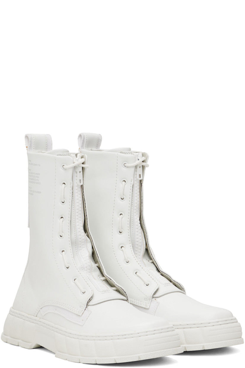 Handcrafted ankle-high Appleskin™ faux-leather boots in white.

· PETA-certified
· Zip closure
· Wraparound lace-up fastening
· Text printed at outer side
· Pull-loop at heel
· Logo embossed at heel counter
· Logo printed at padded insole
· Faux-leather lining
· Textured recycled rubber-blend sole

Supplier color: White