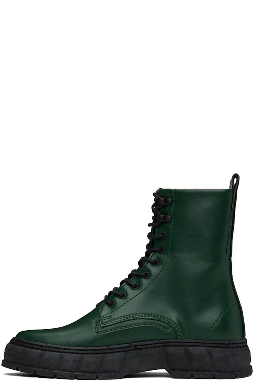 Handcrafted ankle-high Appleskin™ faux-leather boots in green.

· PETA-certified
· Lace-up closure
· Padded tongue and collar
· Text printed at outer side
· Pull-loop at heel
· Logo embossed at heel counter
· Logo printed at padded insole
· Faux-leather lining
· Textured recycled rubber-blend sole

Supplier color: Forest