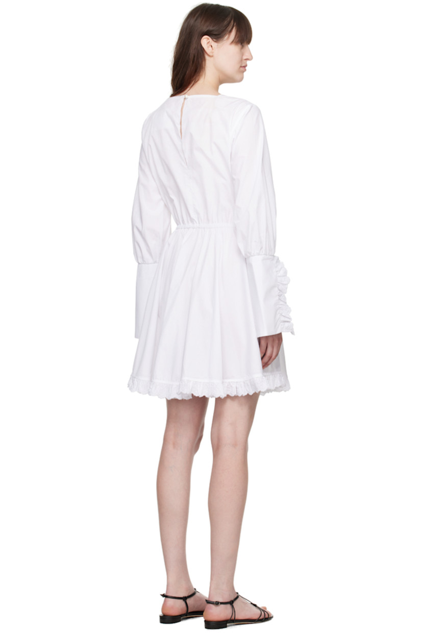 Cotton poplin dress. Ruffled trim with embroidered floral detailing at hem and vented cuffs.

· Square neck
· Self-tie strap with bow accent at elasticized waistband
· Gathering at sleeves
· Button fastening at back collar

Supplier color: White