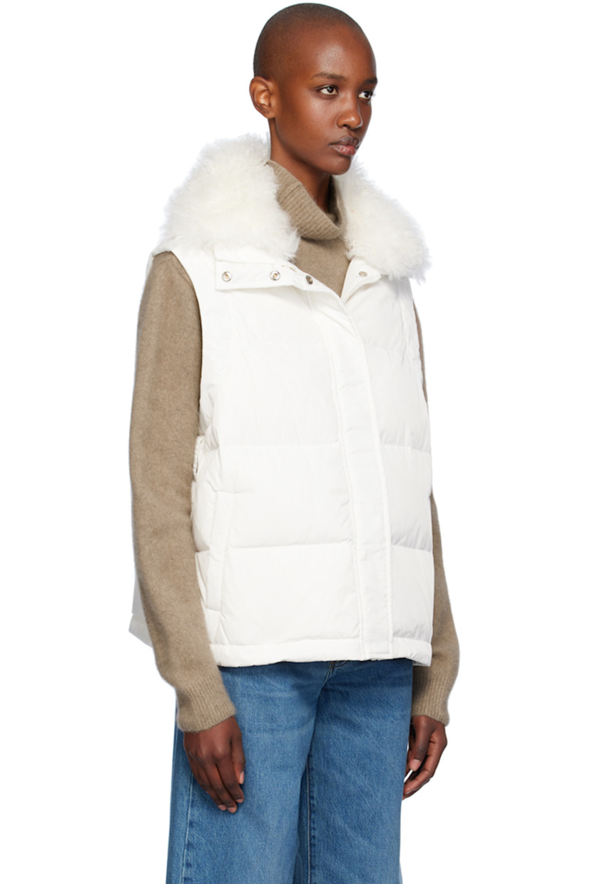 Down-filled and quilted polyester taffeta jacket.

· Press-stud throat guard at detachable hood
· Shearling trim at funnel neck
· Zip closure with press-stud placket
· Welt pockets
· Bungee-style drawstring at hem
· Detachable self-tie belt
· Detachable sleeves
· Elasticized cuffs
· Full satin lining

Supplier color: Cime

Fill: 90% duck down, 10% duck feather.