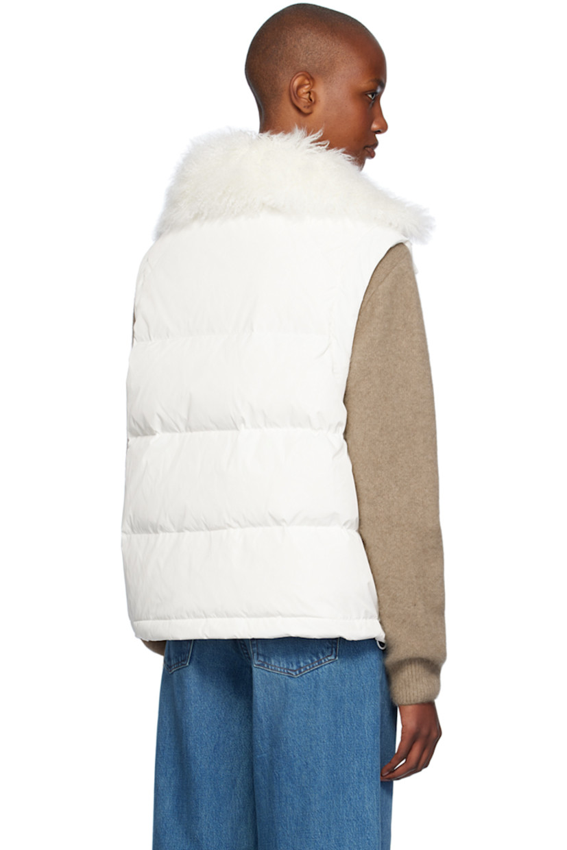 Down-filled and quilted polyester taffeta jacket.

· Press-stud throat guard at detachable hood
· Shearling trim at funnel neck
· Zip closure with press-stud placket
· Welt pockets
· Bungee-style drawstring at hem
· Detachable self-tie belt
· Detachable sleeves
· Elasticized cuffs
· Full satin lining

Supplier color: Cime

Fill: 90% duck down, 10% duck feather.