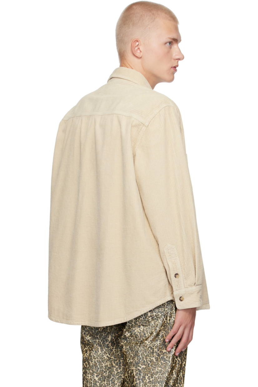 Cotton corduroy shirt.

· Spread collar
· Button closure
· Patch pockets
· Droptail hem
· Single-button barrel cuffs

Supplier color: Ecru