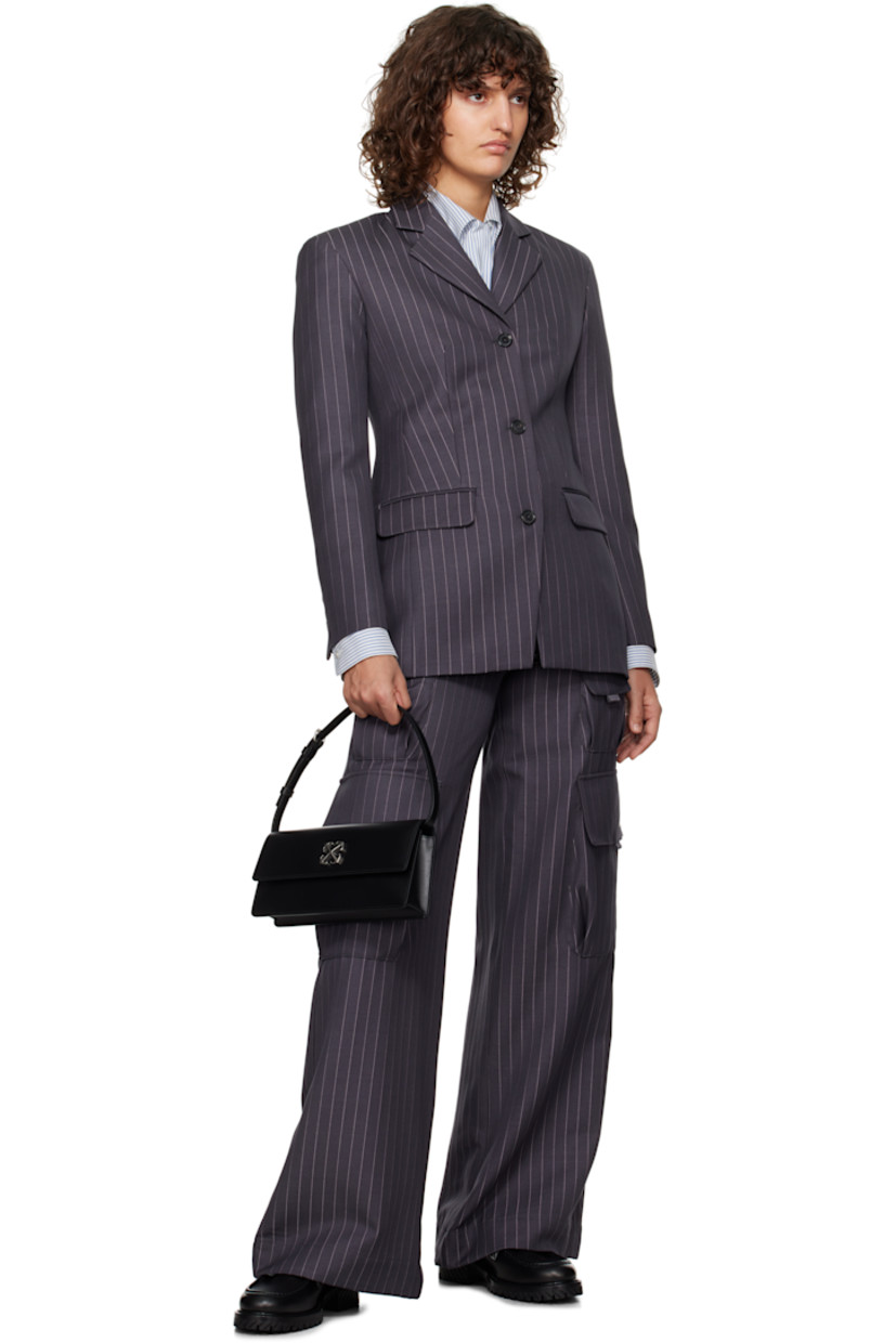 Virgin wool-blend twill blazer. Pinstripes throughout.

· Notched lapel
· Button closure
· Flap pockets
· Padded shoulders
· Logo embroidered at cuff
· Four-button surgeon's cuffs
· Central vent at back hem
· Full logo-woven viscose satin lining

Supplier color: Forged iron