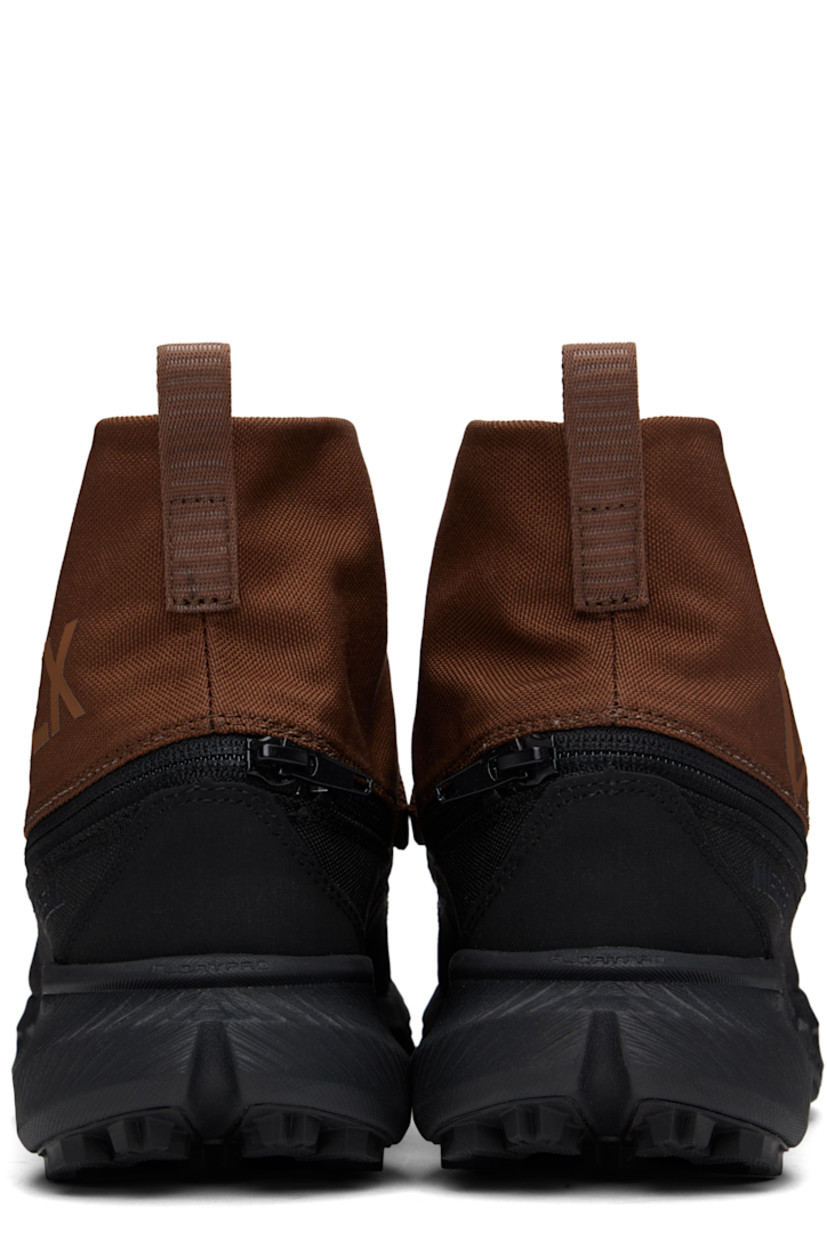 High-top GORE-TEX® canvas sneakers in brown, green, and black. Removable logo-bonded shroud with offset press-stud fastening at vamp for alternate styling.

· Cleansport NXT™-treated odor-control
· Lightweight, waterproof, and breathable
· Bungee-style lace-up closure
· Pull-loop at padded tongue and collar
· Padded collar 
· Logo bonded at outer side
· Breathable recycled mesh lining
· Zip fastening at welt 
· FloatPro™ foam rubber midsole
· Treaded Vibram® Megagrip rubber sole

Supplier color: Rye