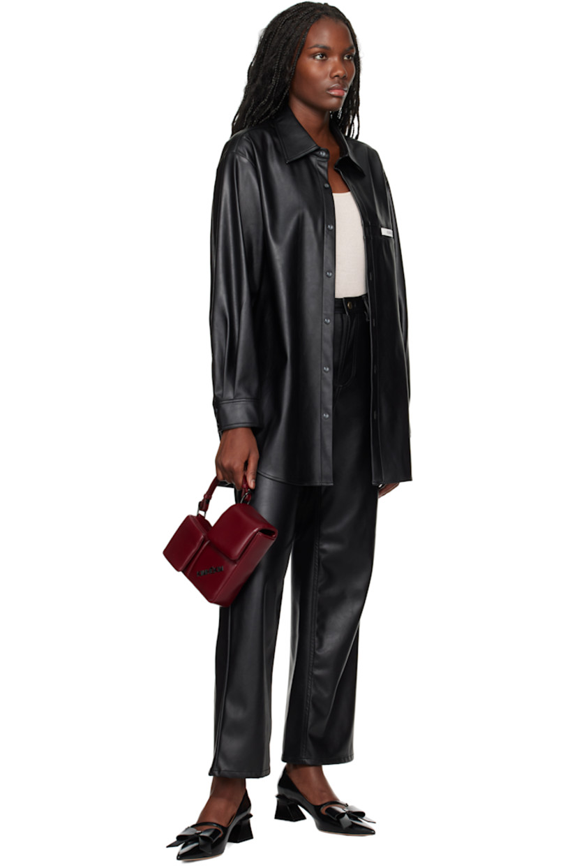 Wide-leg faux-leather pants.

· Belt loops
· Five-pocket styling
· Zip-fly
· Partial sateen lining
· Logo-engraved antiqued gold-tone hardware

Supplier color: Black