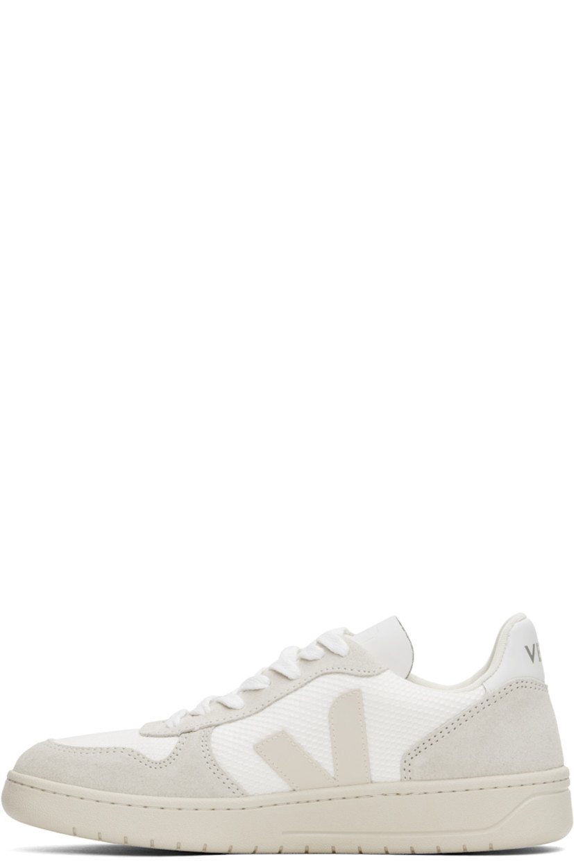 Low-top recycled plastic B-Mesh, suede, and leather sneakers in white.

· Lightweight, breathable, and water-repellent
· Lace-up closure
· Logo embossed at tongue
· Padded collar
· Rubber logo appliqué at sides
· Logo printed at heel tab
· Recycled polyester jersey lining
· Treaded rubber sole 

Supplier color: White natural/Pierre