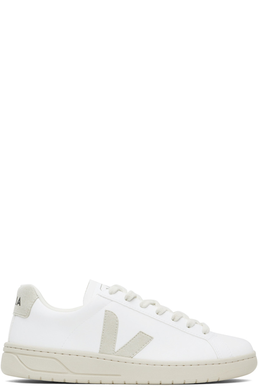 Low-top grained C.W.L. faux-leather and faux-suede sneakers in white.

· Lace-up closure
· Logo printed at padded tongue
· Padded collar 
· Logo appliqué at sides
· Logo printed at heel tab
· Mesh lining
· Treaded rubber sole

Supplier color: White/Natural