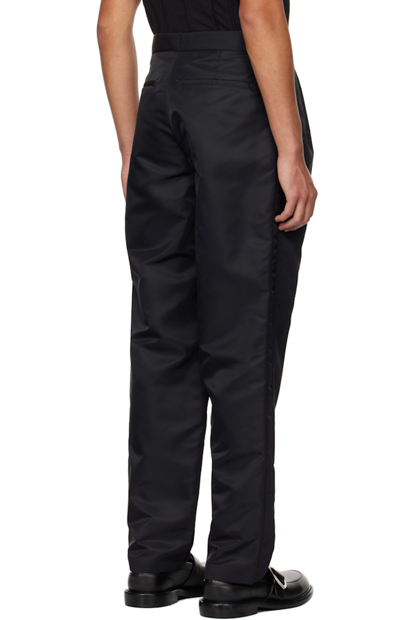 GRS-certified recycled nylon taffeta trousers.

· High-rise
· Five-pocket styling
· Zip fly
· Central pleats at front waistband
· Taffeta stripe at outseam

Supplier color: Black