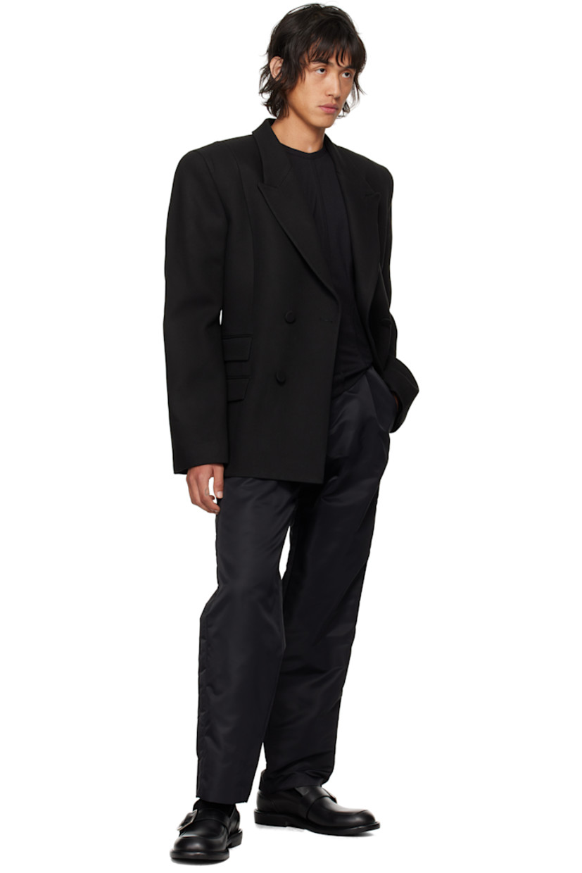 GRS-certified recycled nylon taffeta trousers.

· High-rise
· Five-pocket styling
· Zip fly
· Central pleats at front waistband
· Taffeta stripe at outseam

Supplier color: Black