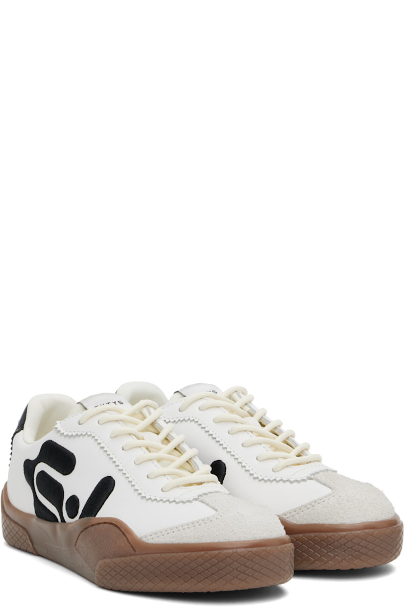 Low-top nappa leather, suede, and canvas sneakers in off-white.

· Serrated detailing throughout
· Lace-up closure
· Logo patch at padded tongue
· Padded collar
· Logo graphic embroidered at sides
· Text embroidered at heel
· Buffed faux-leather lining
· Treaded rubber sole

Supplier color: Swan