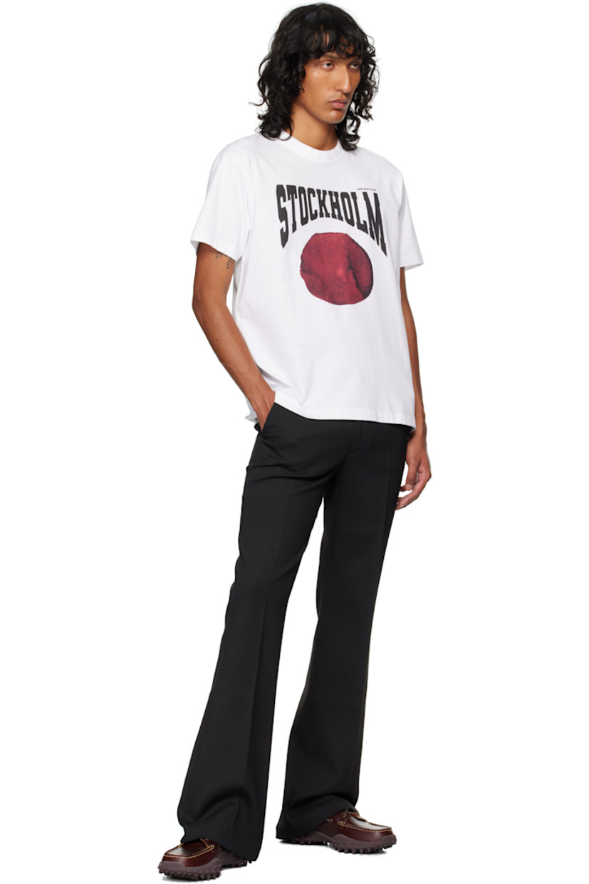 Relaxed-fit organic cotton jersey T-shirt.

· Layered rib-knit crewneck
· Logo, text, and graphic printed at front
· Logo flag at side seam

Supplier color: Stockholm