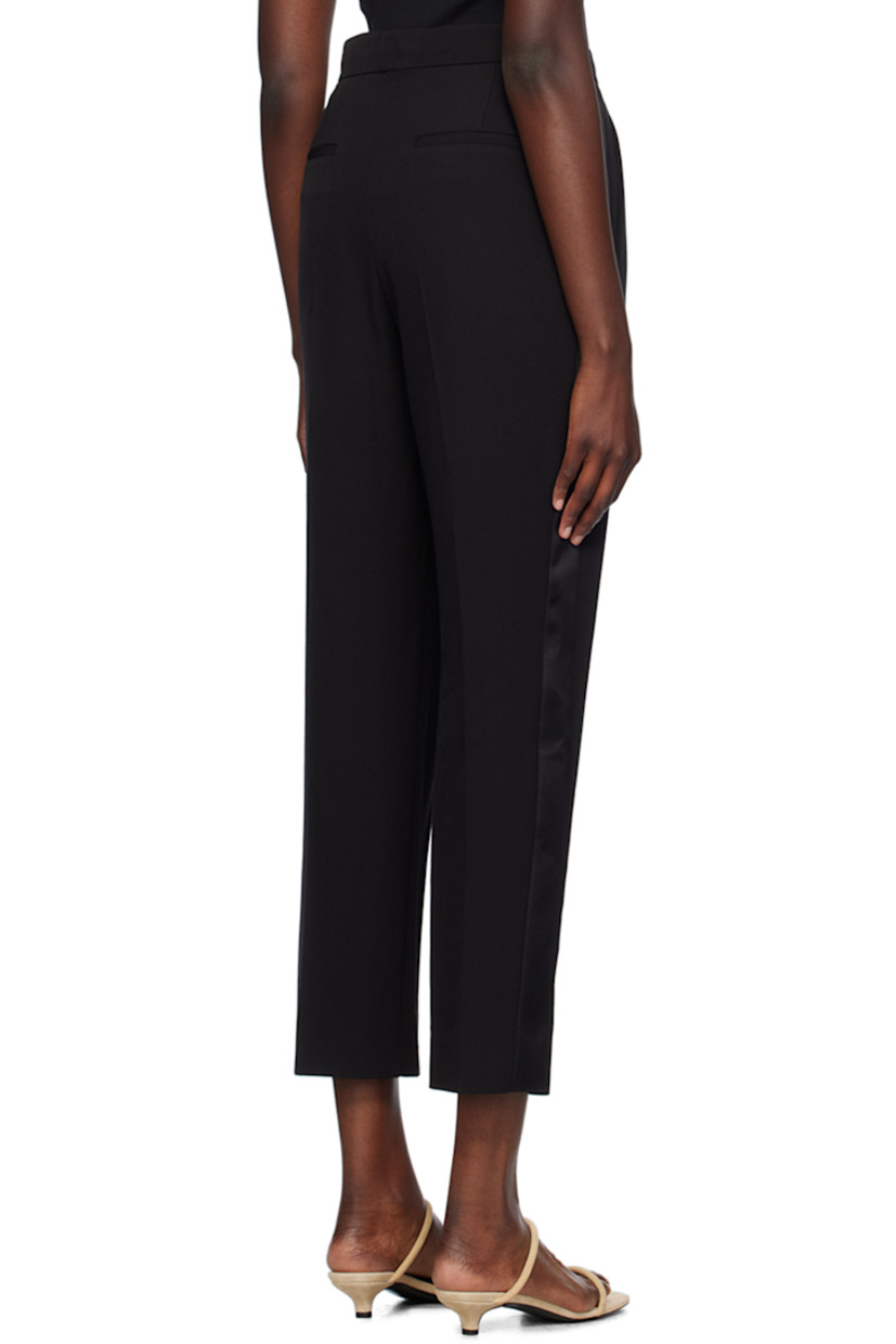 Tapered virgin wool grain de poudre trousers.

· Four-pocket styling
· Zip-fly
· Pleats at front
· Satin trim at outseams 
· Creased legs

Supplier color: Black