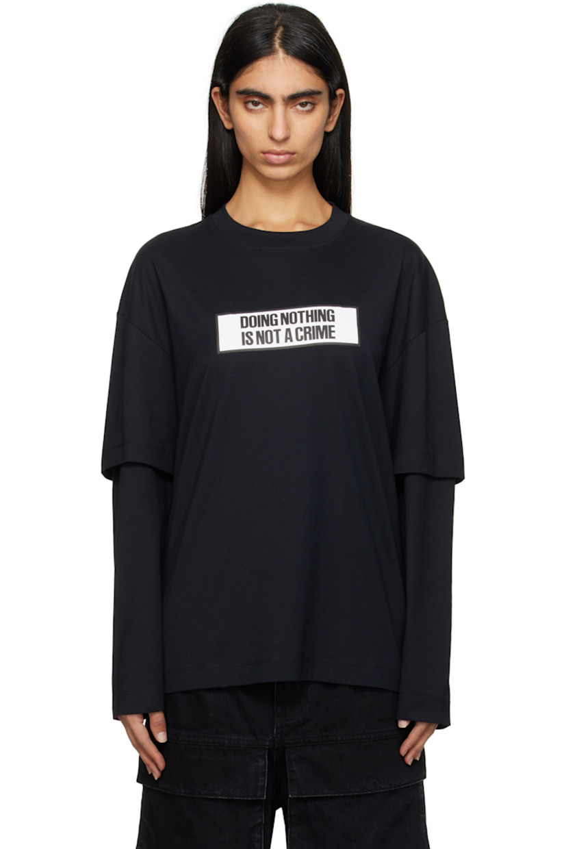 Organic cotton jersey T-shirt.

· Layered construction
· Rib-knit crewneck
· Text printed at chest
· Logo embroidered at hem 
· Dropped shoulders

Supplier color: Black