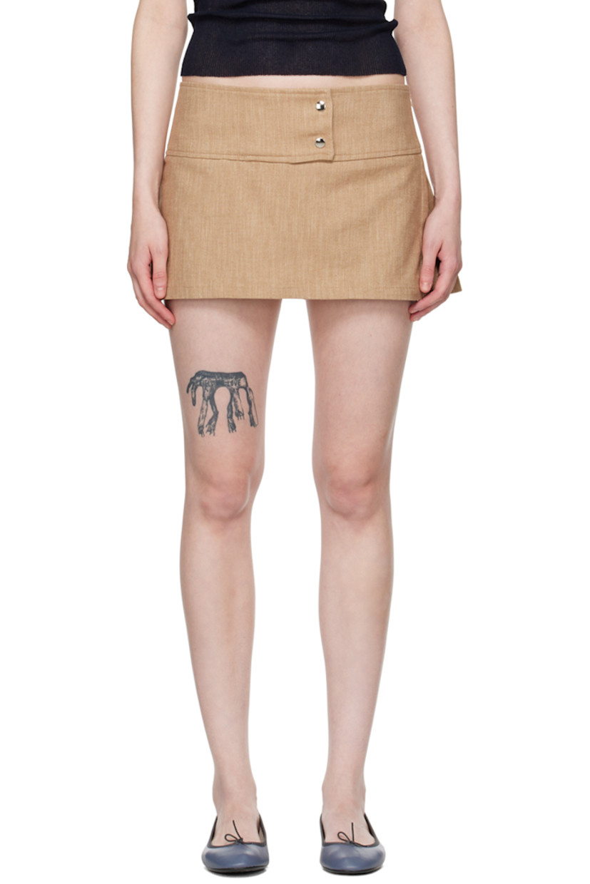 Stretch recycled cotton-blend hopsack skort.

· Layered construction
· Low-rise
· Press-stud fastenings at waist
· Zip closure and vent at side seam
· Shorts-style underlay

Supplier color: Beige