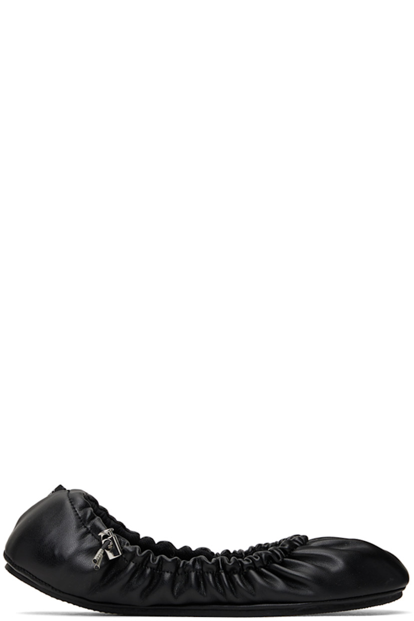 Handcrafted Bureau Veritas-certified grained faux-leather ballerina flats in black.

· Gathering throughout
· Bungee-style drawstring at collar
· Logo flag at heel
· Piqué and grained faux-leather lining
· Treaded TPU sole

Supplier color: Black beyond leather