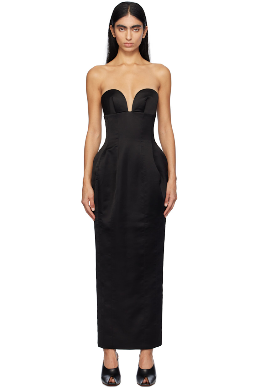 Polyester satin maxi dress.

· Sweetheart neck
· Boning at bodice
· Darts at front and back
· Concealed zip and hook-eye closure at back
· Central vent at back hem

Supplier color: Black