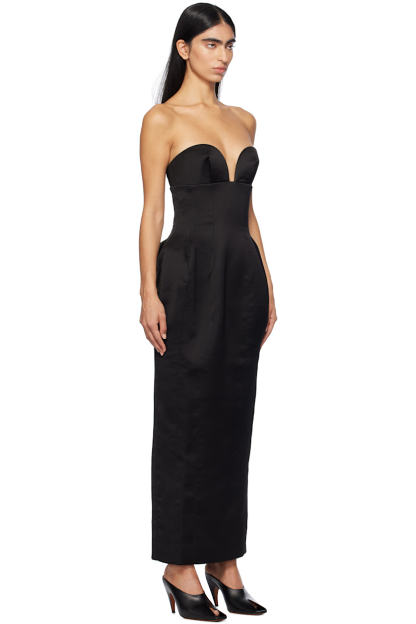 Polyester satin maxi dress.

· Sweetheart neck
· Boning at bodice
· Darts at front and back
· Concealed zip and hook-eye closure at back
· Central vent at back hem

Supplier color: Black