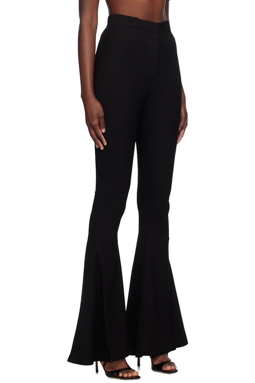 Flared polyester crepe trousers. Twisted seams throughout.

· Belt loops
· Zip-fly
· Vented cuffs

Supplier color: Black
