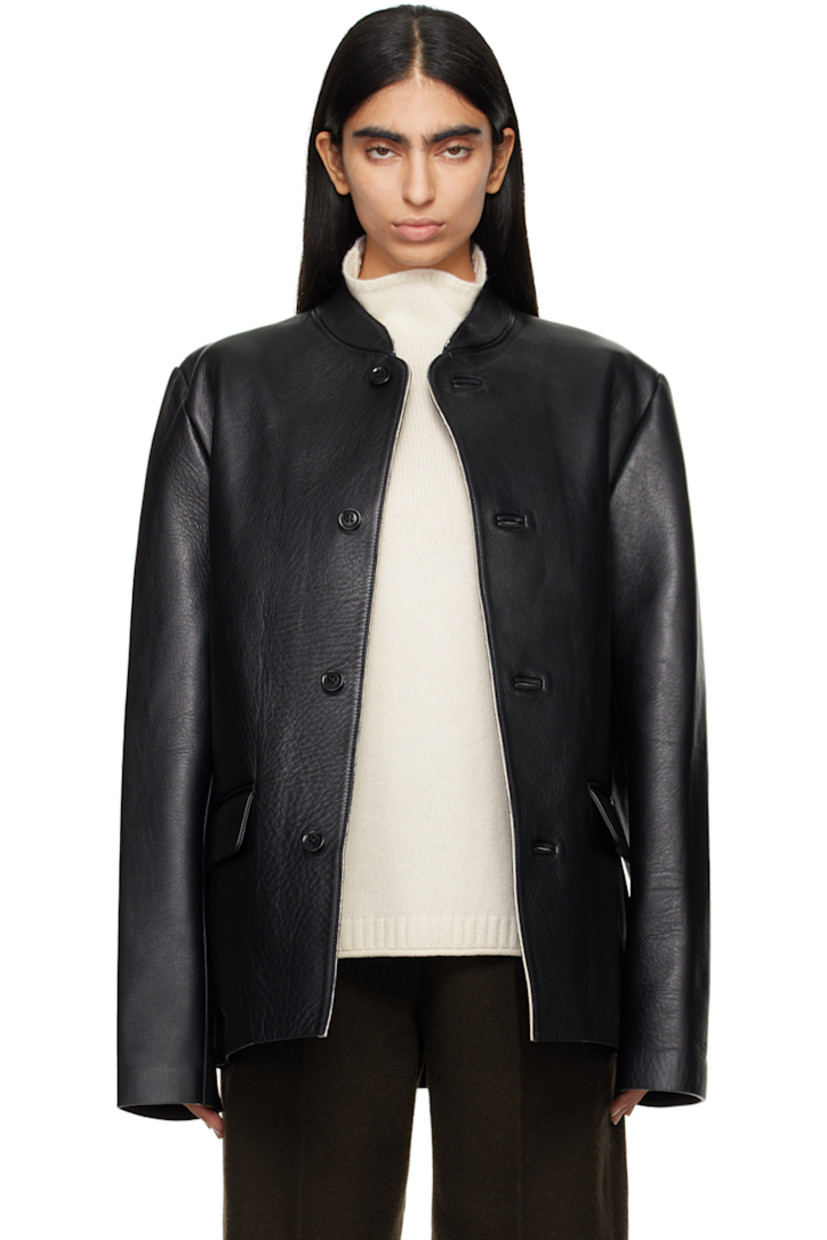 Grained leather jacket. 

· Band collar
· Button closure
· Flap pockets
· Full bonded suede lining

Supplier color: Black