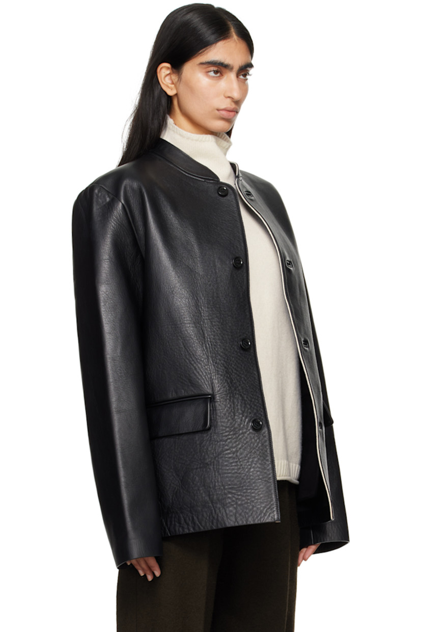 Grained leather jacket. 

· Band collar
· Button closure
· Flap pockets
· Full bonded suede lining

Supplier color: Black