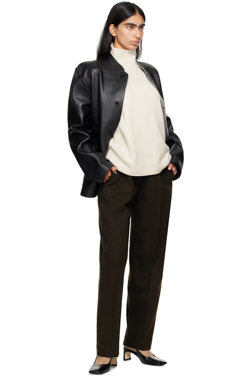 Grained leather jacket. 

· Band collar
· Button closure
· Flap pockets
· Full bonded suede lining

Supplier color: Black