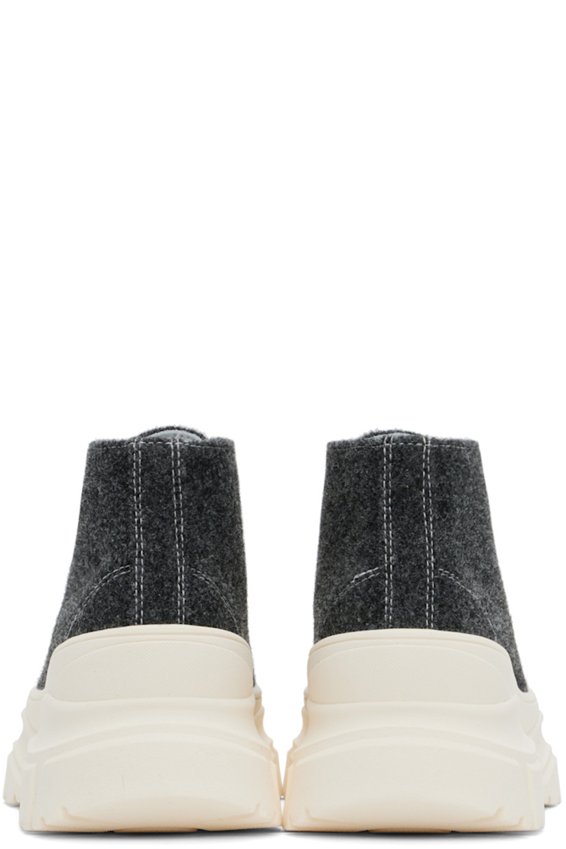High-top melton sneakers in black.

· Rubber cap toe
· Lace-up closure
· Grained leather lining
· Rubber platform midsole
· Treaded rubber sole 
· Platform: H2" 

Supplier color: Shadow