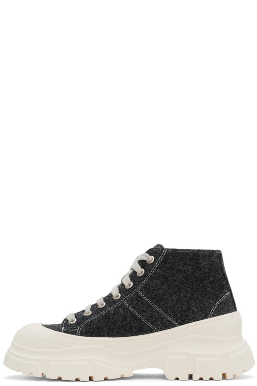 High-top melton sneakers in black.

· Rubber cap toe
· Lace-up closure
· Grained leather lining
· Rubber platform midsole
· Treaded rubber sole 
· Platform: H2" 

Supplier color: Shadow