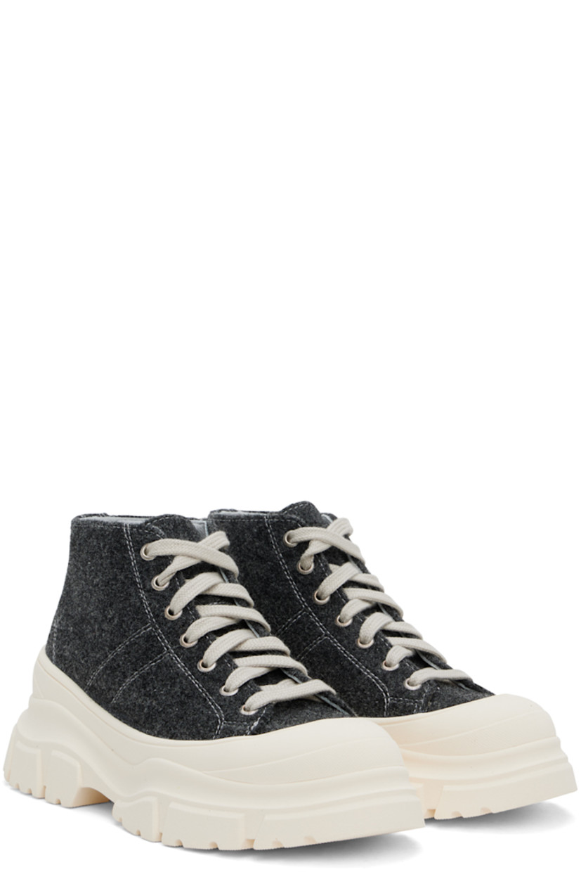 High-top melton sneakers in black.

· Rubber cap toe
· Lace-up closure
· Grained leather lining
· Rubber platform midsole
· Treaded rubber sole 
· Platform: H2" 

Supplier color: Shadow