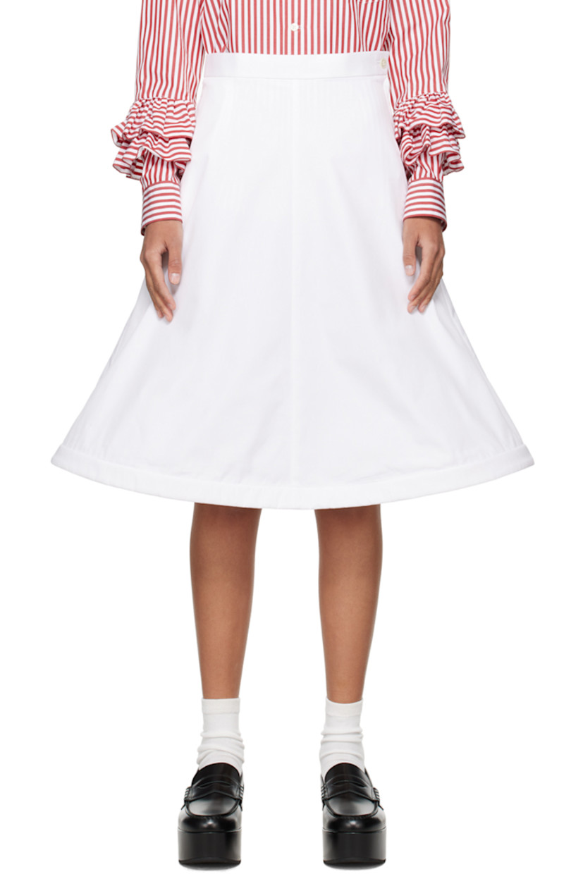 Cotton broadcloth skirt. 

· Single-pocket styling
· Concealed wire at structured flared hem
· Concealed zip closure at side 

Supplier color: White