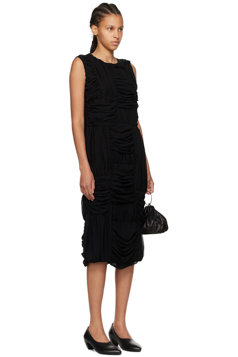 Polyester georgette dress. Ruching throughout.

· Paneled construction
· Round neck
· Ruffles at front and back
· Seam pockets
· Concealed zip closure at back
· Central vent at back hem
· Fully lined

Supplier color: Black