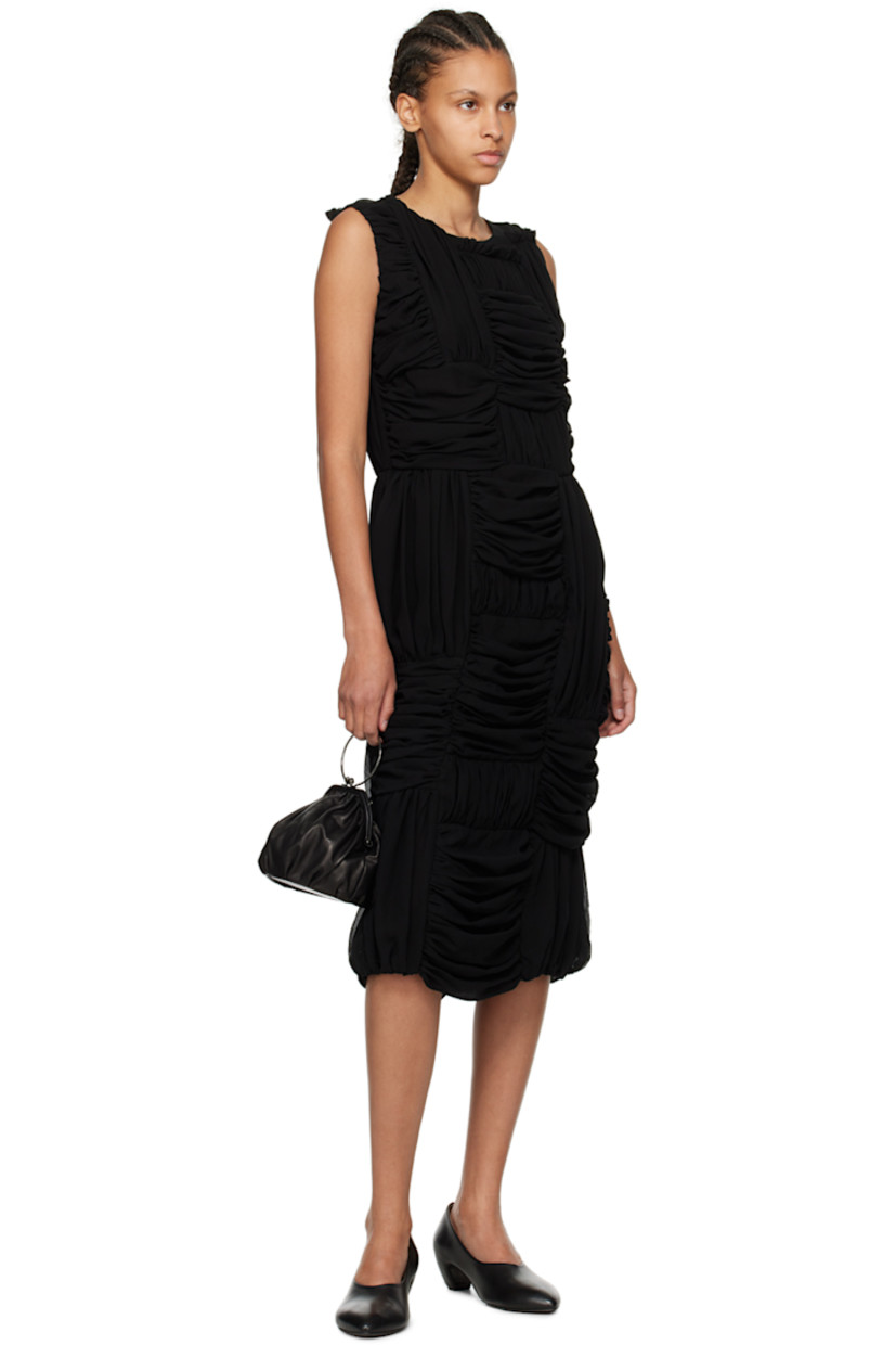Polyester georgette dress. Ruching throughout.

· Paneled construction
· Round neck
· Ruffles at front and back
· Seam pockets
· Concealed zip closure at back
· Central vent at back hem
· Fully lined

Supplier color: Black