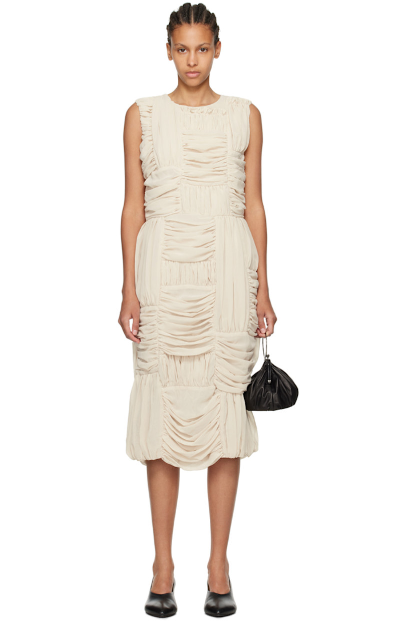 Polyester georgette dress. Ruching throughout.

· Paneled construction
· Round neck
· Ruffles at front and back
· Seam pockets
· Concealed zip closure at back
· Central vent at back hem
· Fully lined

Supplier color: Beige