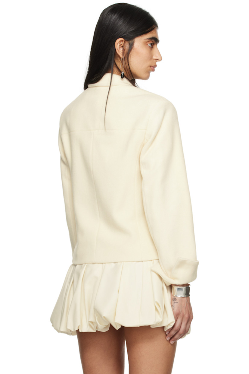 Brushed wool melton jacket. 

· Spread collar
· Double-breasted button closure
· Zip pockets
· Padded shoulders
· Vented cuffs
· Full plain-woven cotton lining 

Part of the exclusive SSENSE Bridal capsule.

Supplier color: White