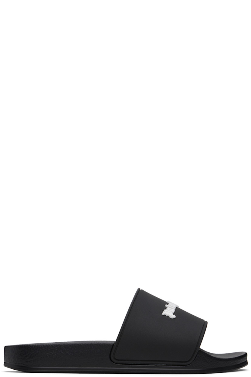 Rubber pool slides in black.

· Open toe
· Strap and logo embossed at vamp
· Logo embossed at molded faux-leather footbed
· Treaded rubber sole

Supplier color: Black/White