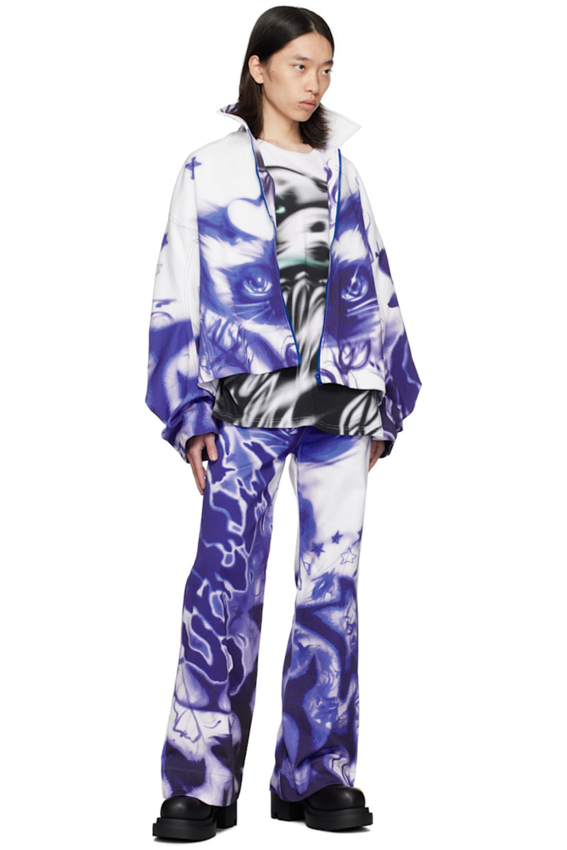 Oversized non-stretch denim jacket. Graphic airbrushed throughout.

· Spread collar
· Zip closure
· Seam pockets
· Inset elasticized cuffs
· Contrast stitching in blue

Supplier color: White/Blue