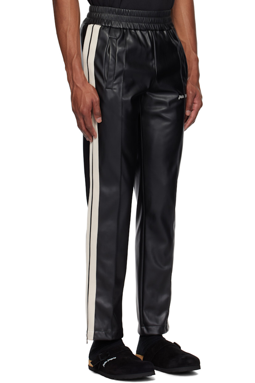 Grained faux-leather track pants.

· Elasticized waistband
· Two-pocket styling
· Pinched seam at front legs
· Logo embroidered at front
· Zip vent at cuffs
· Striped knit trim at outseams
· Full microfibre lining

Supplier color: Black/Off white