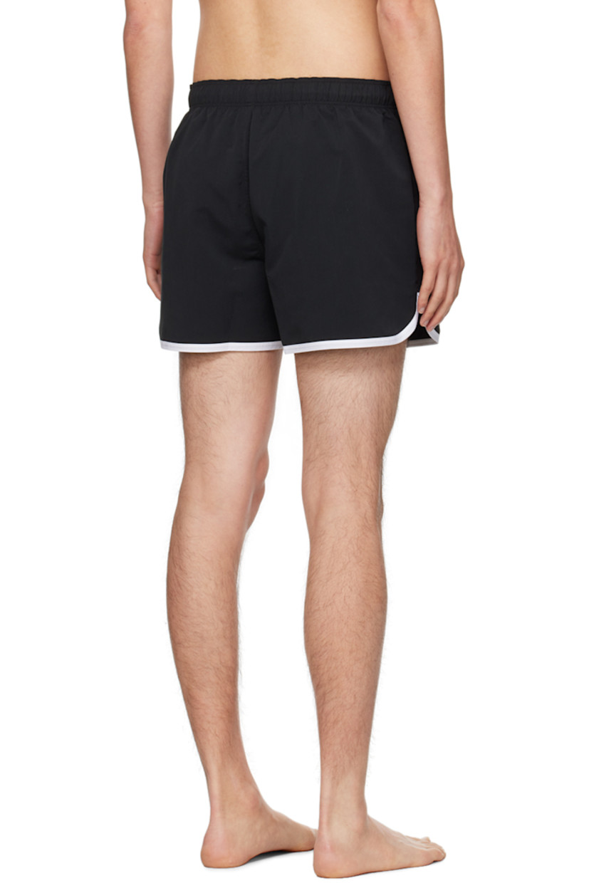 Polyester taffeta swim shorts.

· Drawstring at elasticized waistband
· Two-pocket styling
· Logo embroidered at front
· Piping at cuffs
· Integrated mesh shorts-style underlay

Supplier color: Black/Off white