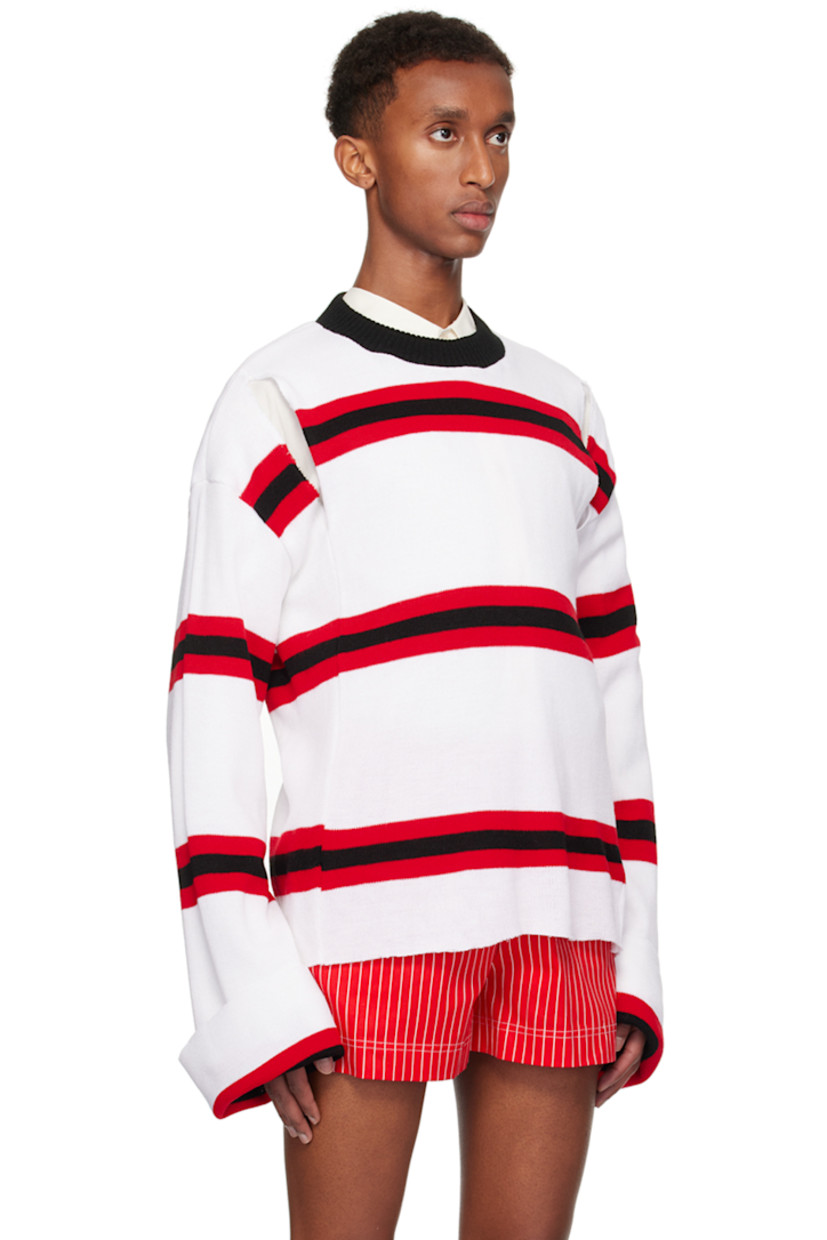 Upcycled knit acrylic- and cotton-blend sweater. Jacquard stripes throughout.

· Rib knit crewneck
· Slits at front
· Dropped shoulders

Available exclusively at SSENSE.

Supplier color: White/Red/Black