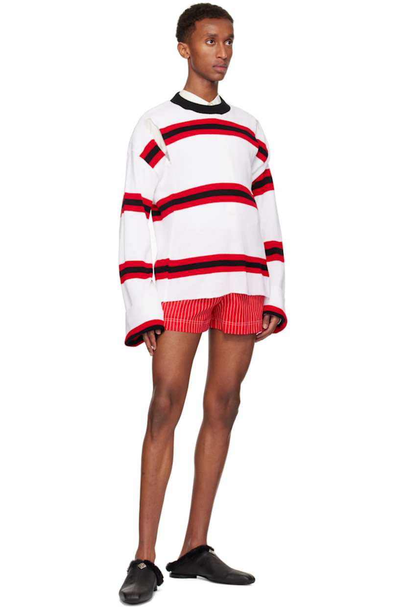 Upcycled knit acrylic- and cotton-blend sweater. Jacquard stripes throughout.

· Rib knit crewneck
· Slits at front
· Dropped shoulders

Available exclusively at SSENSE.

Supplier color: White/Red/Black