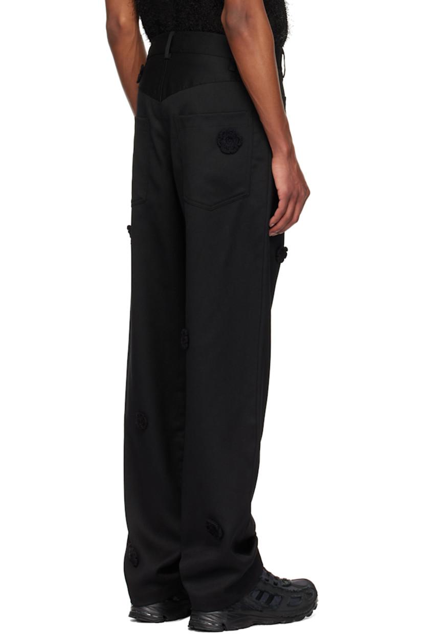 Straight-leg wool drill trousers. Hand-woven cotton floral accents throughout.

· Belt loops
· Five-pocket styling
· Button-fly

Supplier color: Black