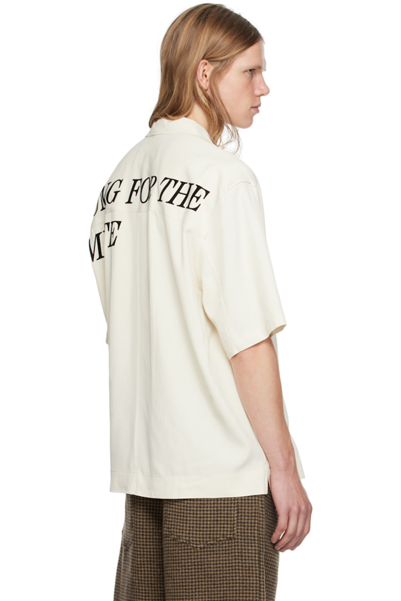 Oversized viscose twill shirt.

· Open spread collar
· Button closure
· Patch pocket 
· Vented side seams
· Dropped shoulders
· Logo flocked at back yoke

Supplier color: White