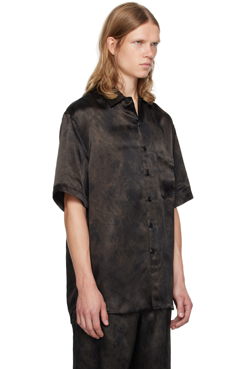 Acetate satin shirt. Paint splatter effect printed throughout.

· Spread collar
· Button closure
· Patch pocket
· Shirttail hem
· Dropped shoulders

Supplier color: Black