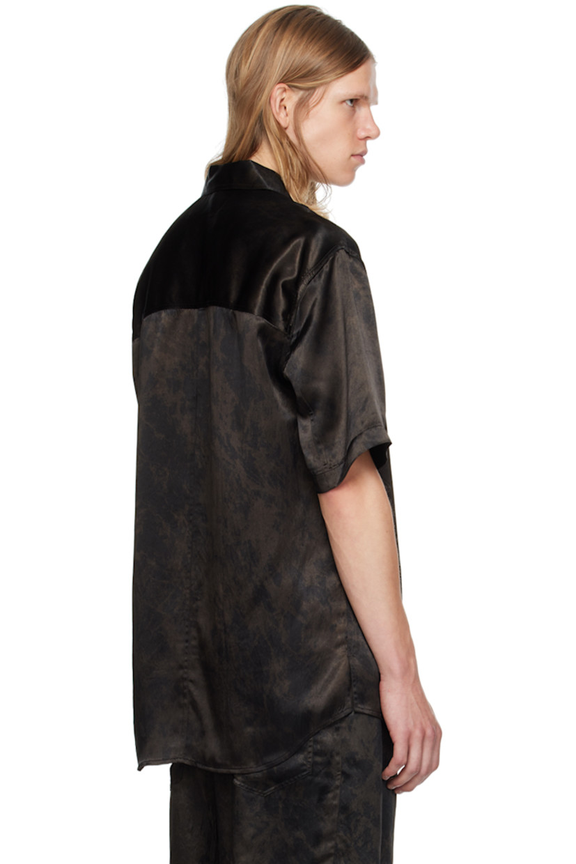 Acetate satin shirt. Paint splatter effect printed throughout.

· Spread collar
· Button closure
· Patch pocket
· Shirttail hem
· Dropped shoulders

Supplier color: Black