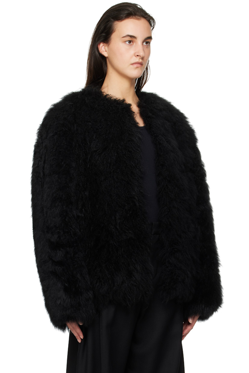 Lambskin fur jacket.

· Round neck
· Hook-eye closure
· Bungee-style drawstring at hem
· Logo patch at back collar
· Full satin lining

Supplier color: Black