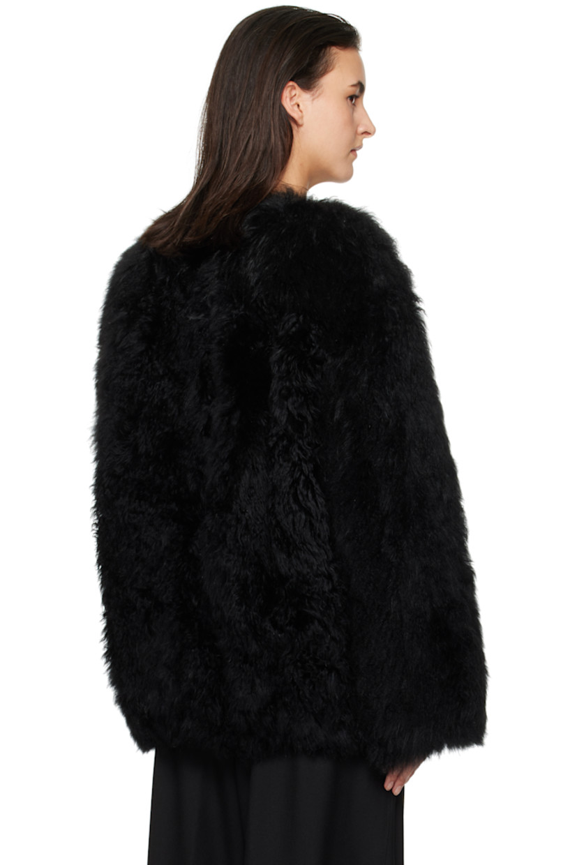 Lambskin fur jacket.

· Round neck
· Hook-eye closure
· Bungee-style drawstring at hem
· Logo patch at back collar
· Full satin lining

Supplier color: Black