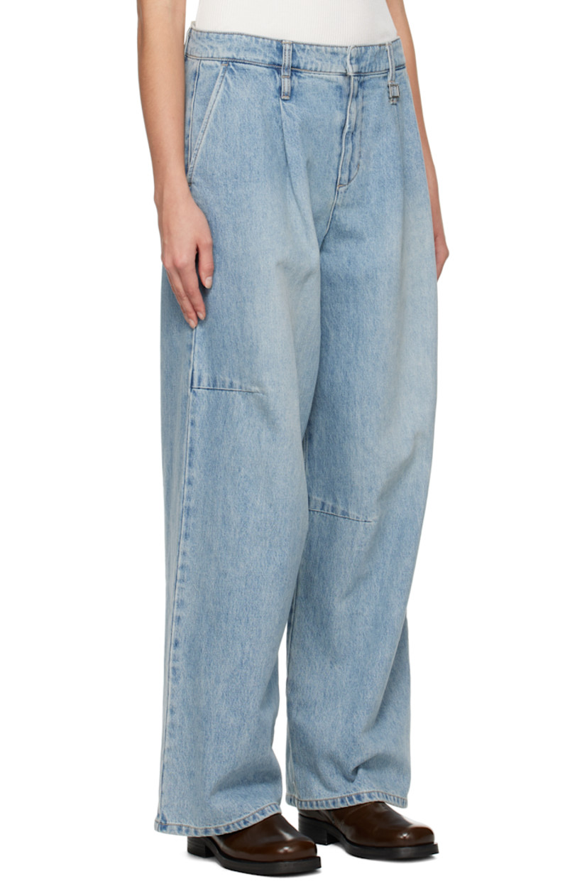 Wide-leg non-stretch denim jeans. Fading throughout.

· Belt loops
· Four-pocket styling
· Zip-fly
· Logo hardware at belt loop
· Pleats at front
· Darts at knees
· Logo patch at back waistband

Supplier color: Blue
